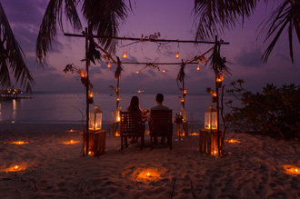 Romantic candle light dinner at the beach Bandos Maldives Resort beach