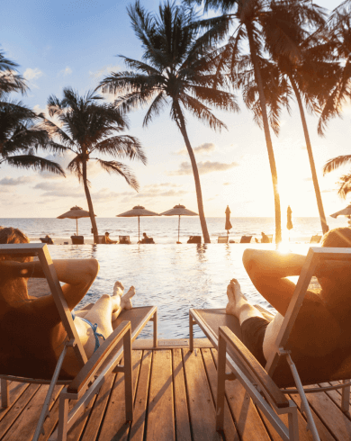 Relaxing by the pool with ocean view at sunset