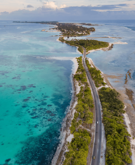 Aerial view of Maldives road with turquoise waters